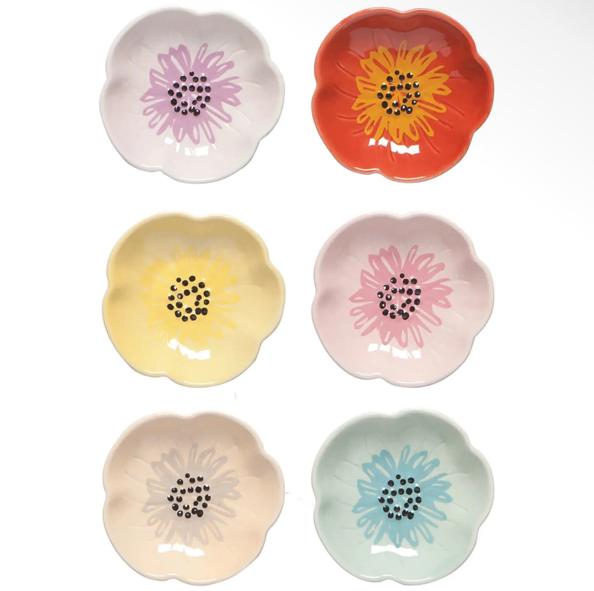 Six flower-shaped ceramic plates. Each with a different pastel or bright floral design including purple, orange, yellow, pink, beige, and blue tones.