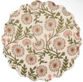 A round fabric placemat with a scalloped edge, featuring a vintage floral pattern in dusty pink and olive green on a cream background.