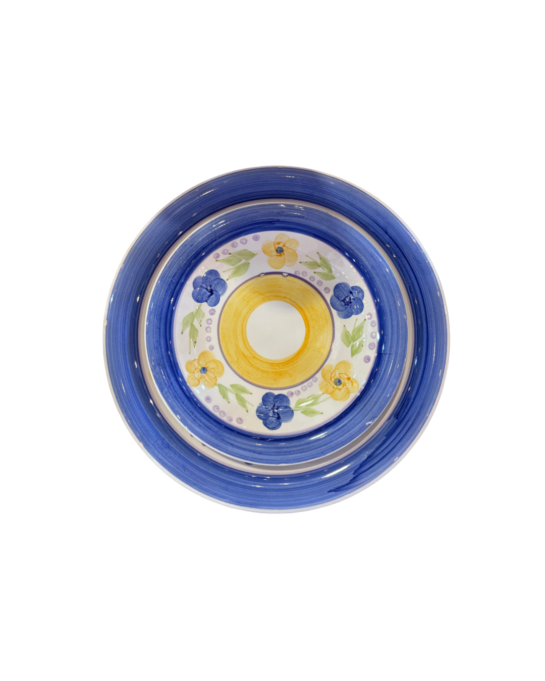 A top-down view of a round ceramic plate with a blue rim, featuring a yellow and white center decorated with blue flowers and green leaves.