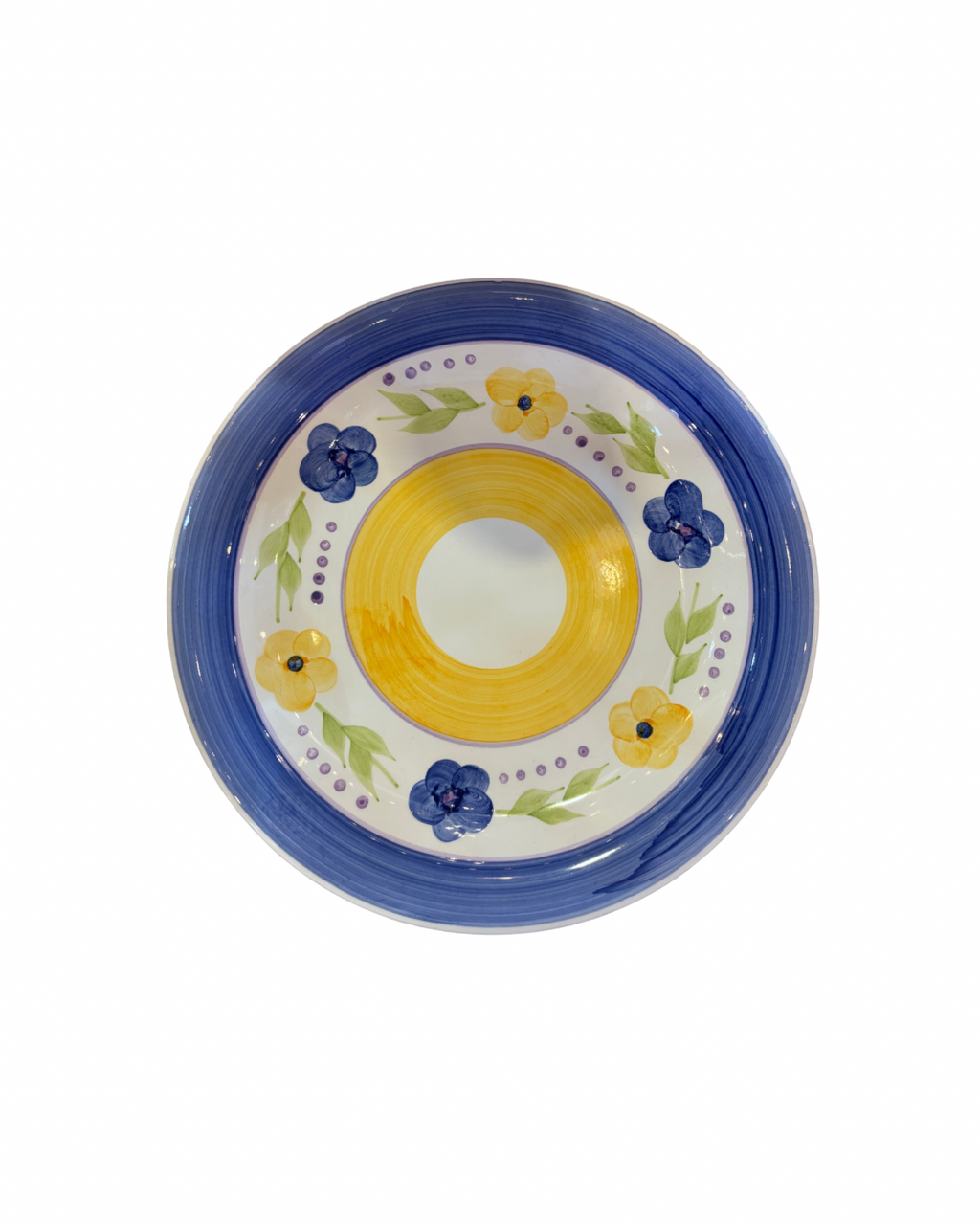 A round ceramic plate with a wide blue rim, featuring a yellow center and a white background decorated with blue and yellow flowers and green leaves.
